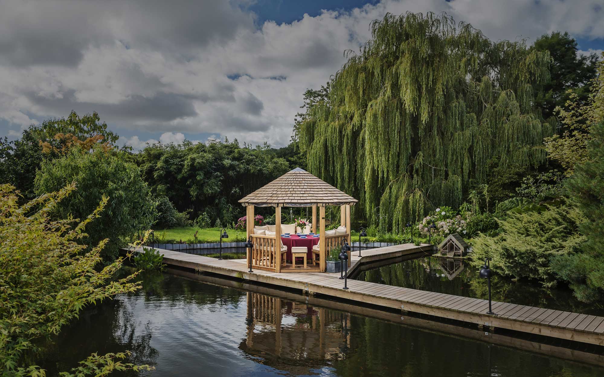 Crown Pavilions wooden gazebo in a garden setting